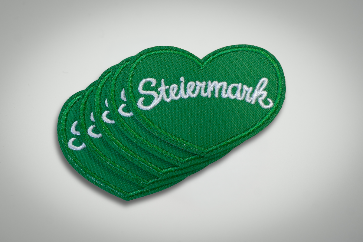 Herz-Patches “draufpickt”